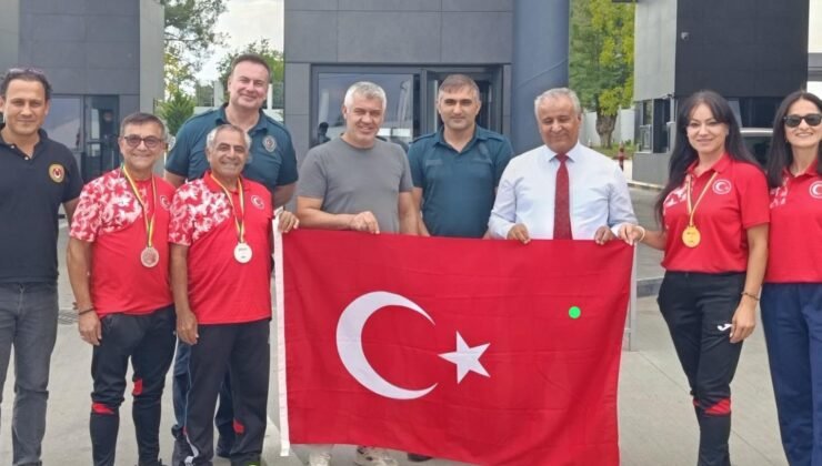 Şampiyonlar sınırda bayrakla karşılandı